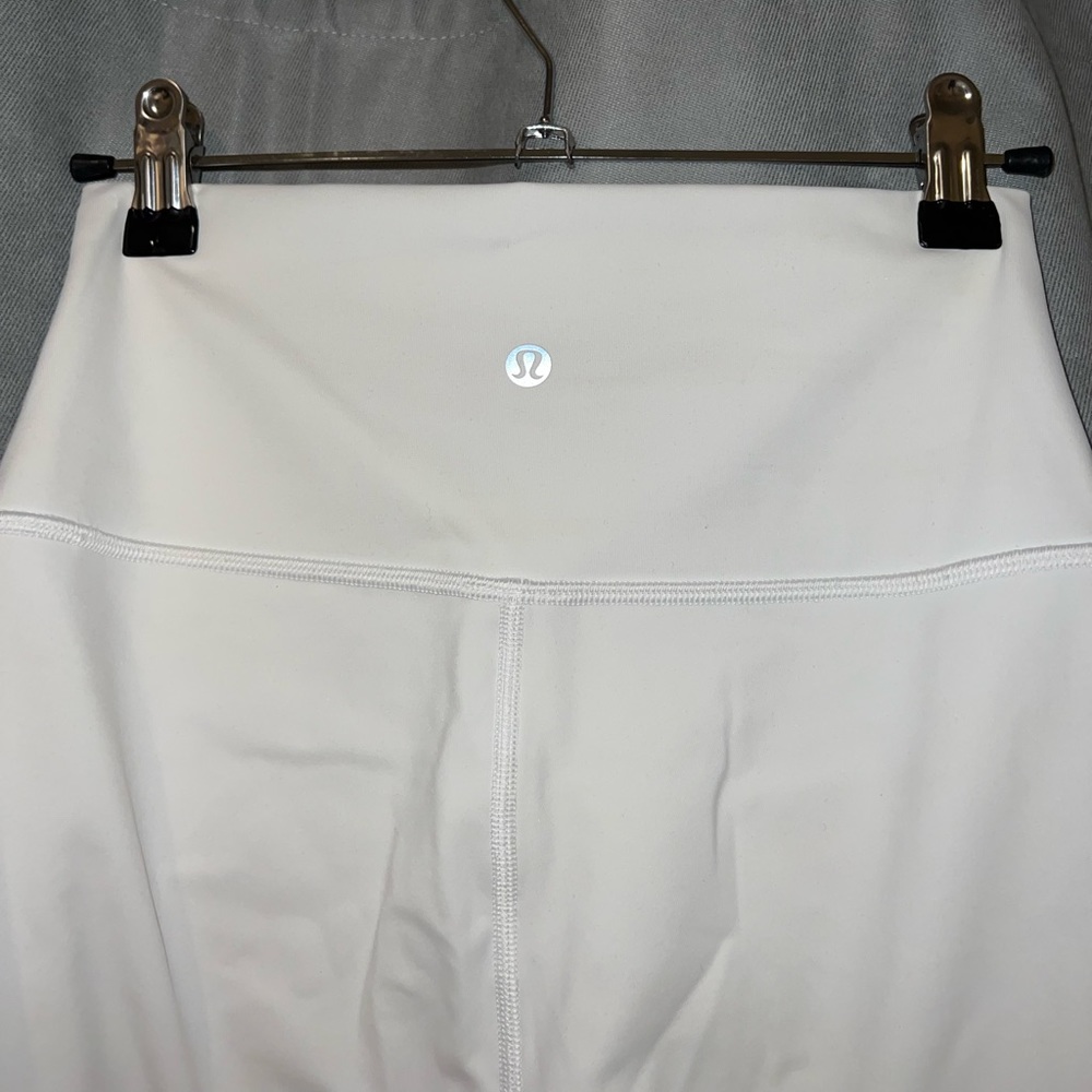 White, size 2 Lululemon leggings! Worn once!